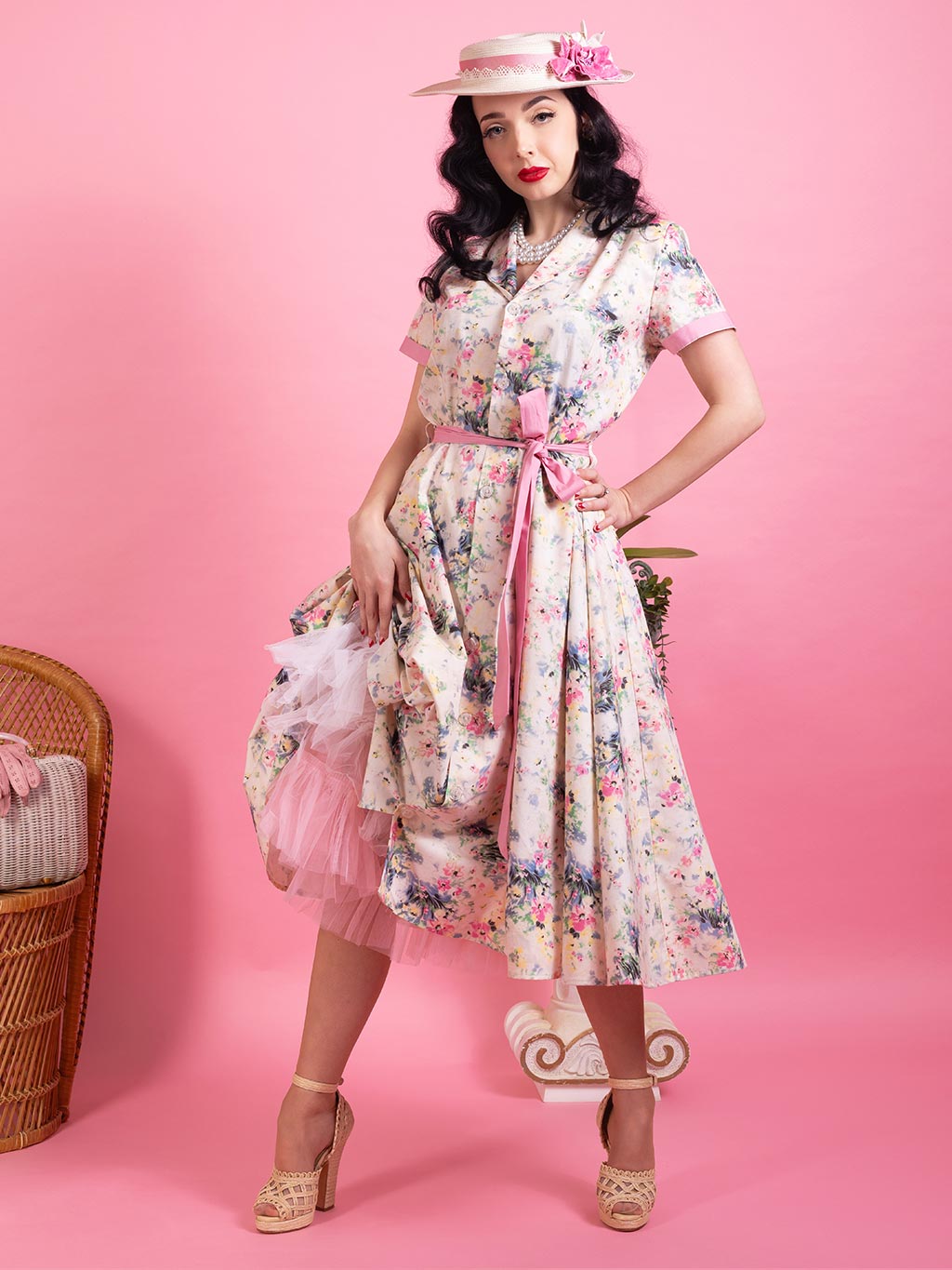Light pink floral pink shirt dress worn with two petticoats.