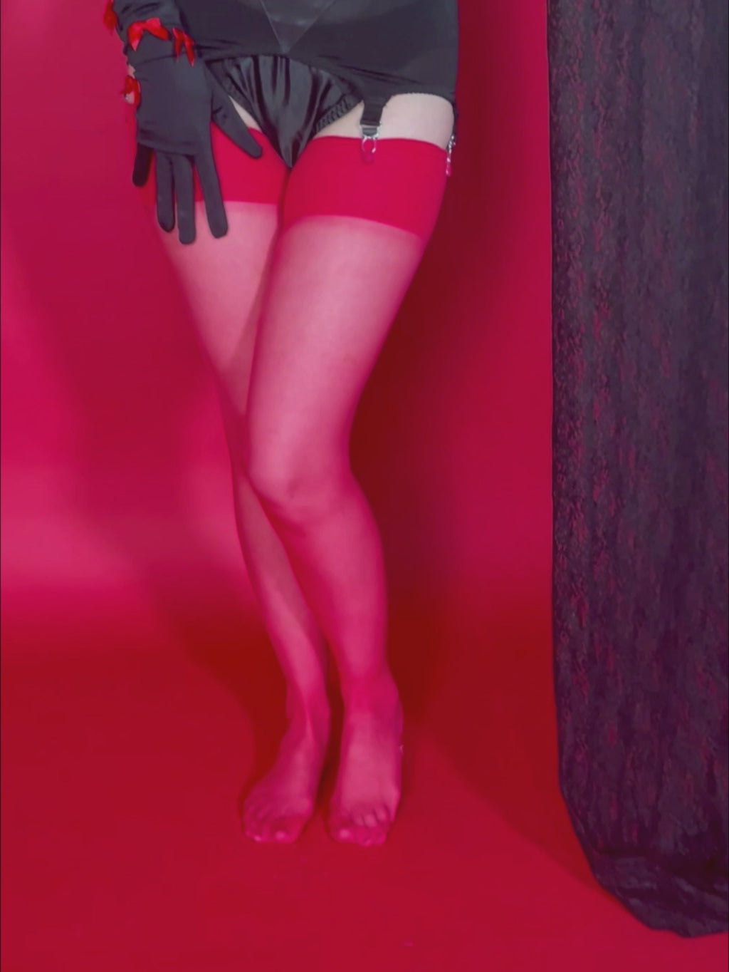 Red seamed stockings inspired by 1920s flapper girls.