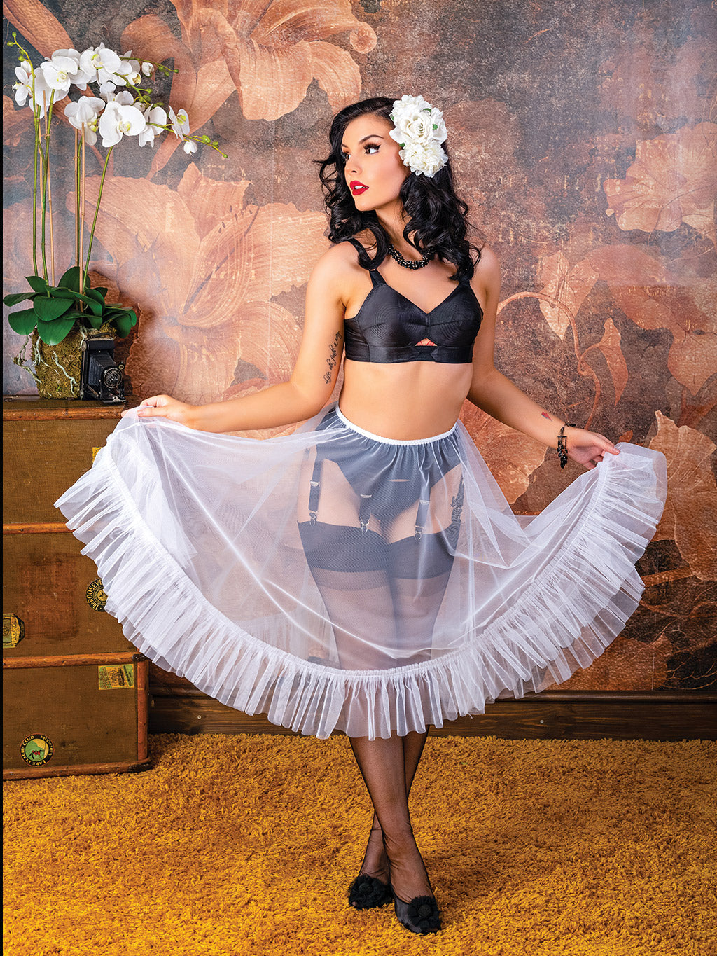 White petticoat paired with black lingerie as a perfect base to any vintage dress