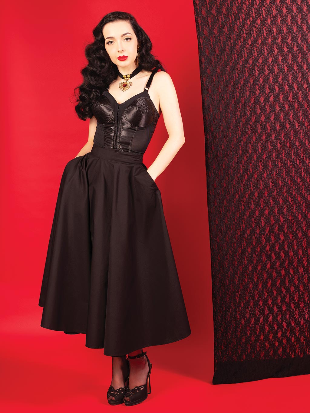 1950s black cotton circle skirt worn with vintage longline bra