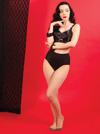 1950s polka dot seamed tights worn with black satin retro lingerie