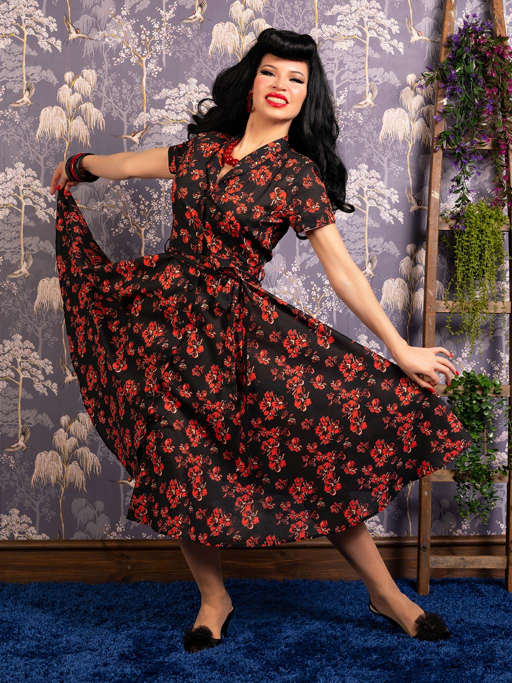 1940s 1950s shirtwaist dress in a vintage red and cream floral print on black background