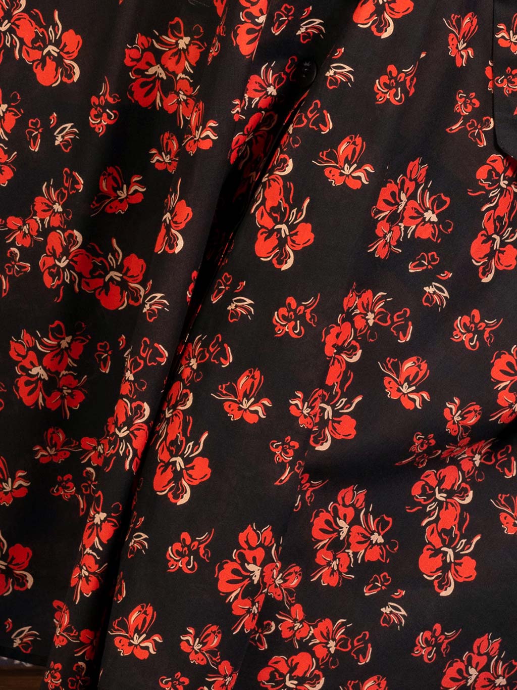 Close up of a 1940s 1950s red, cream and black floral print used in What Katie Did&#39;s shirt dress