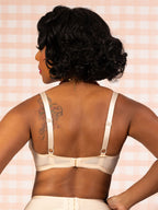 Back of peach celia soft cup bra.