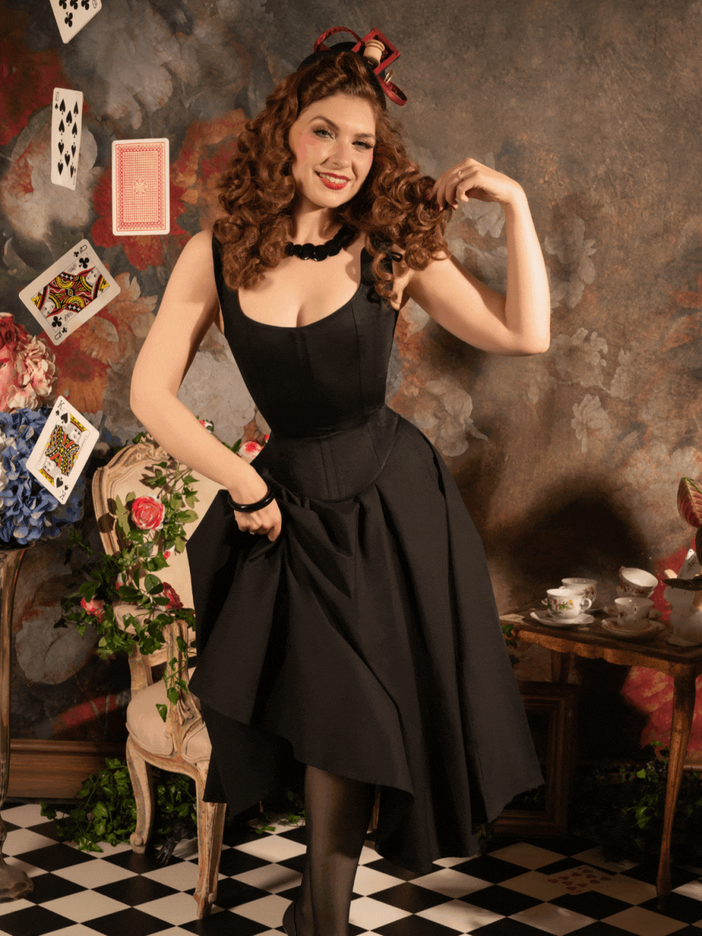 black cotton corset top worn with black circle skirt