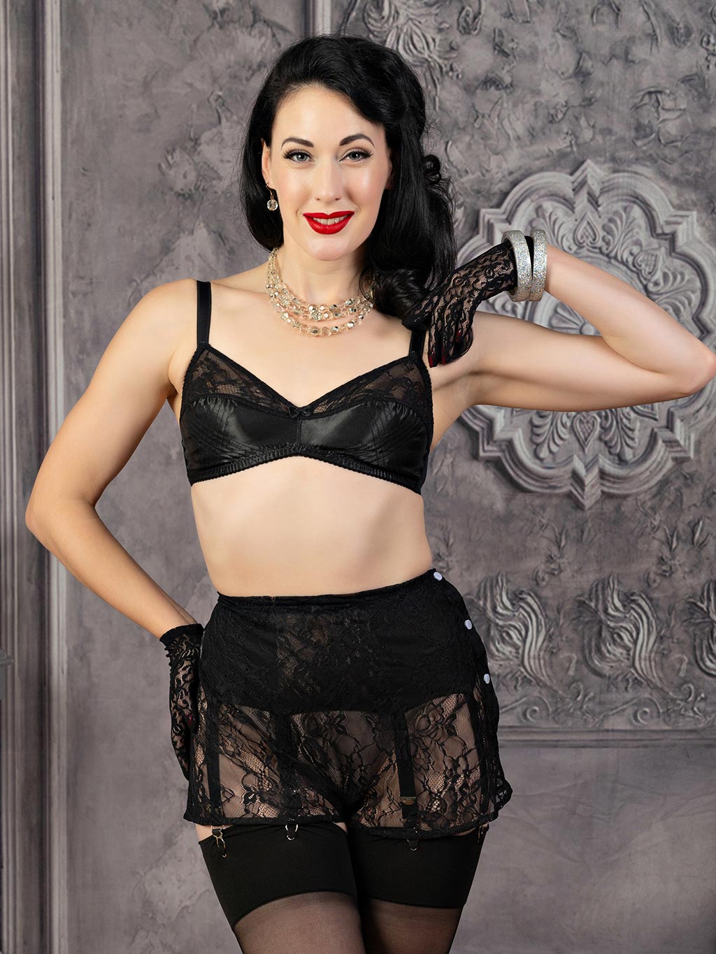1940s inspired black lace french knickers and soft cup bra worn with black seamed stockings and vintage black lace wrist gloves