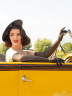 long black sheer opera gloves worn with a black vintage straw hat