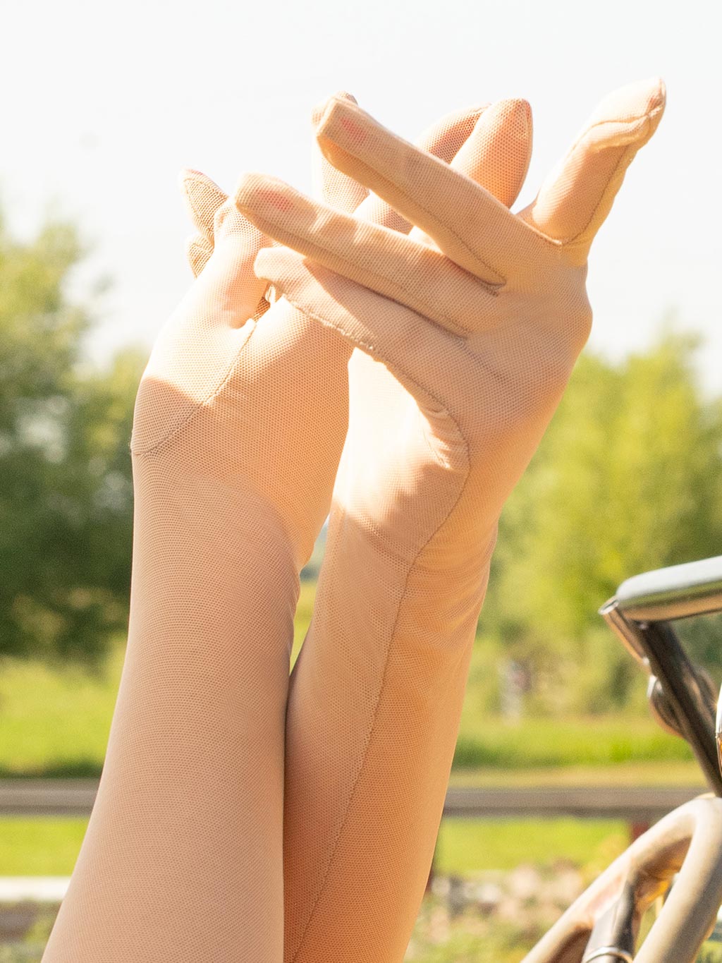 close up long champagne mesh evening gloves 
