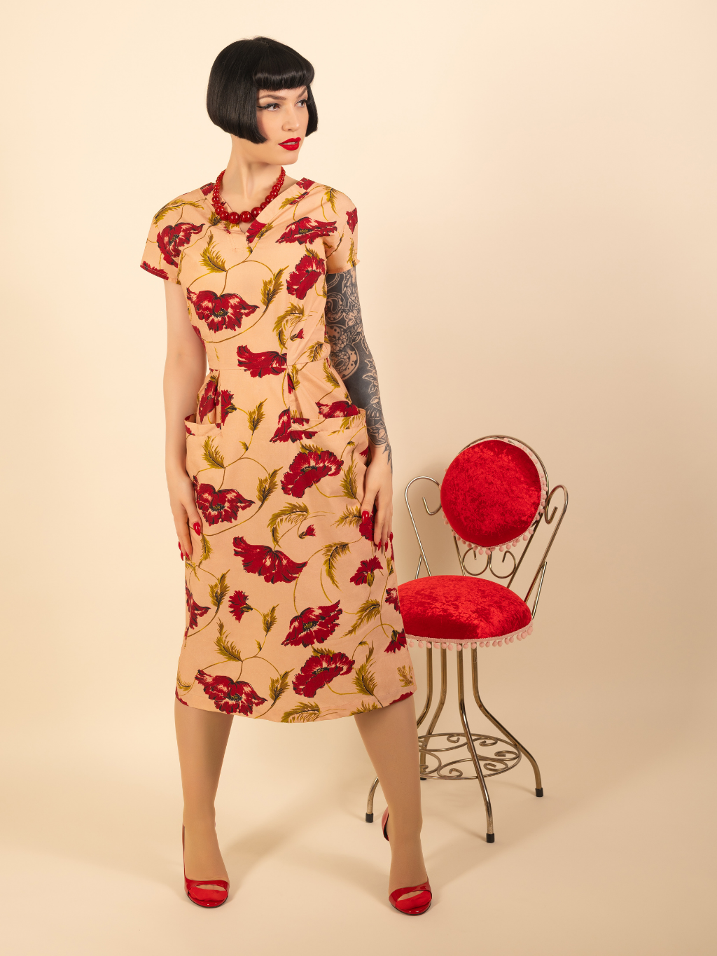 Pink dress with red roses fitted pencil like dress.