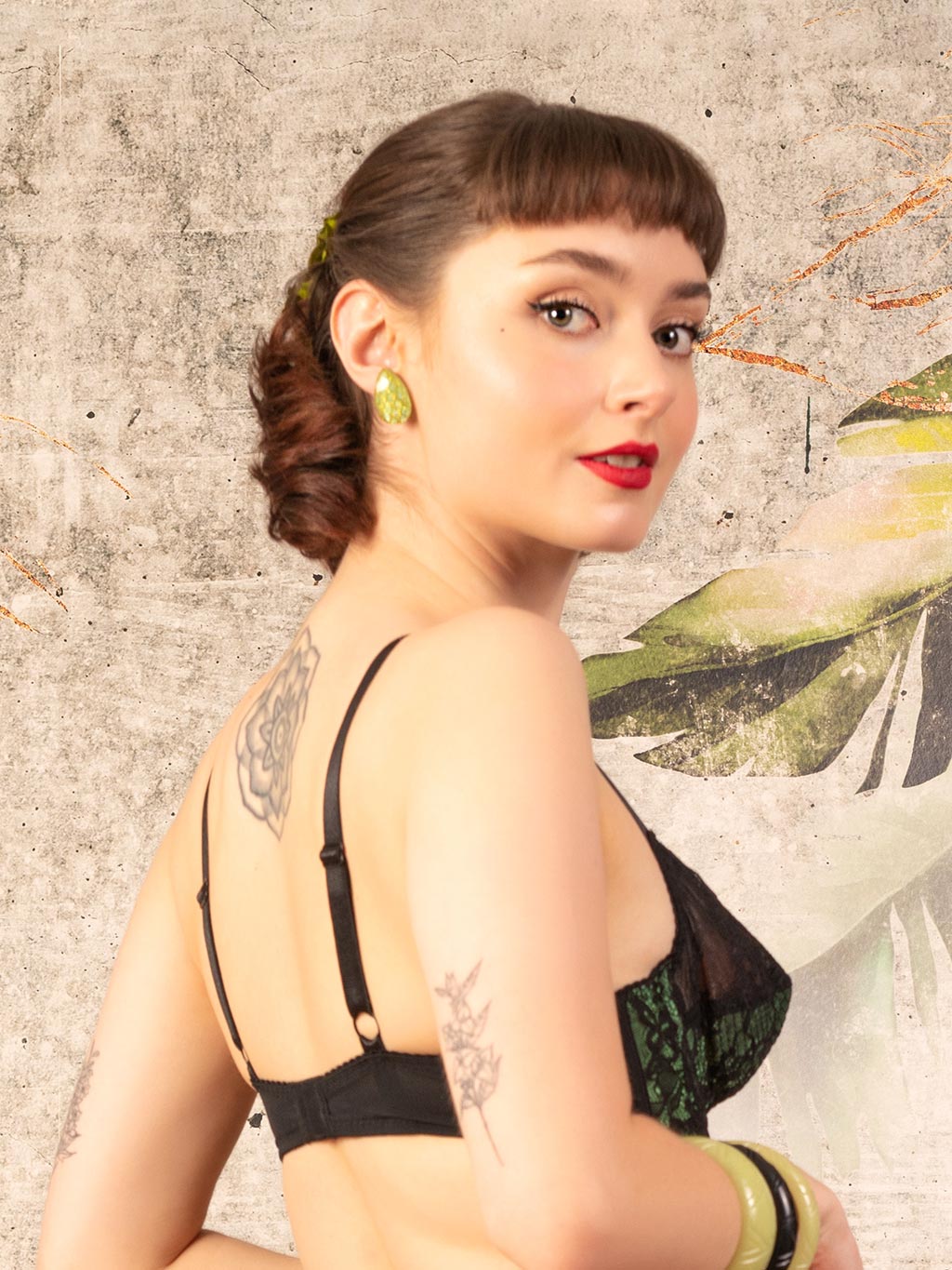 back view of vintage green bra with black lace overlay 