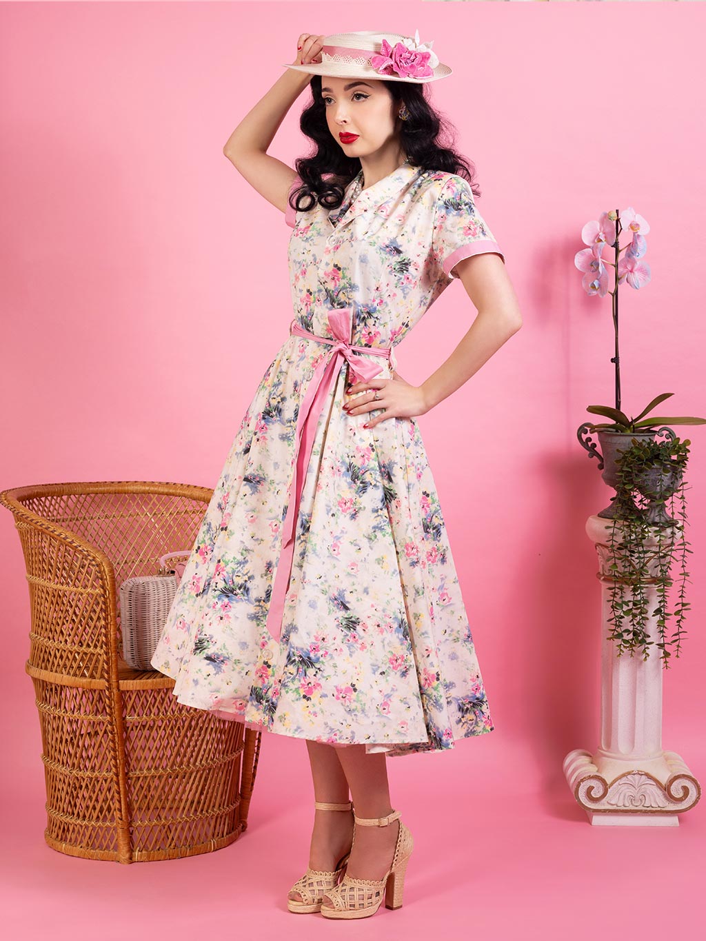 Light pink floral pink shirt dress worn with two petticoats.