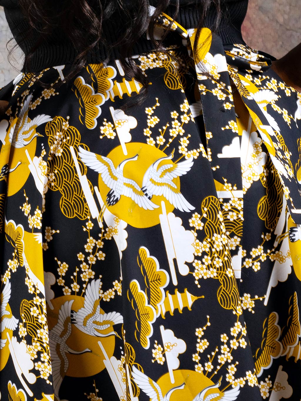 Close up of the Japanese mustard  crane print used for What Katie Did's 1950s circle skirt