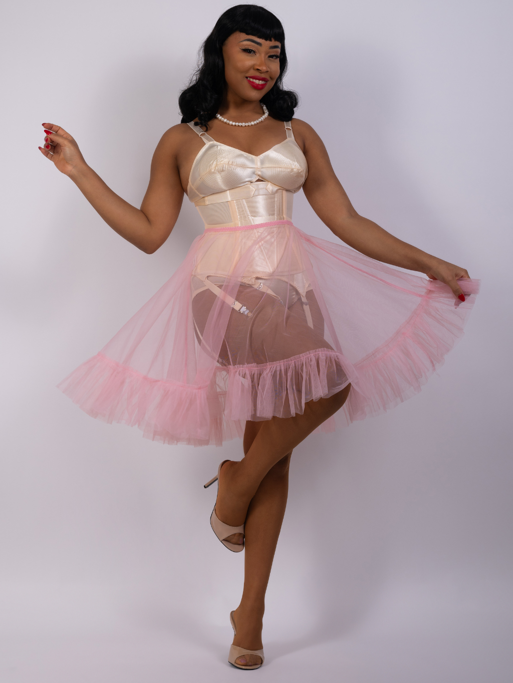 Vintage sheer pink petticoat.