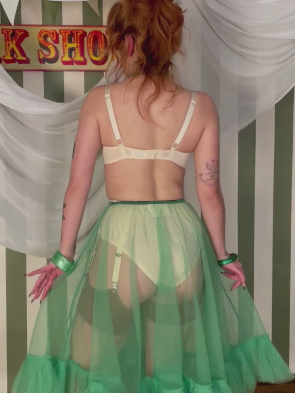 video of sheer green frilly petticoat worn with matching lingerie