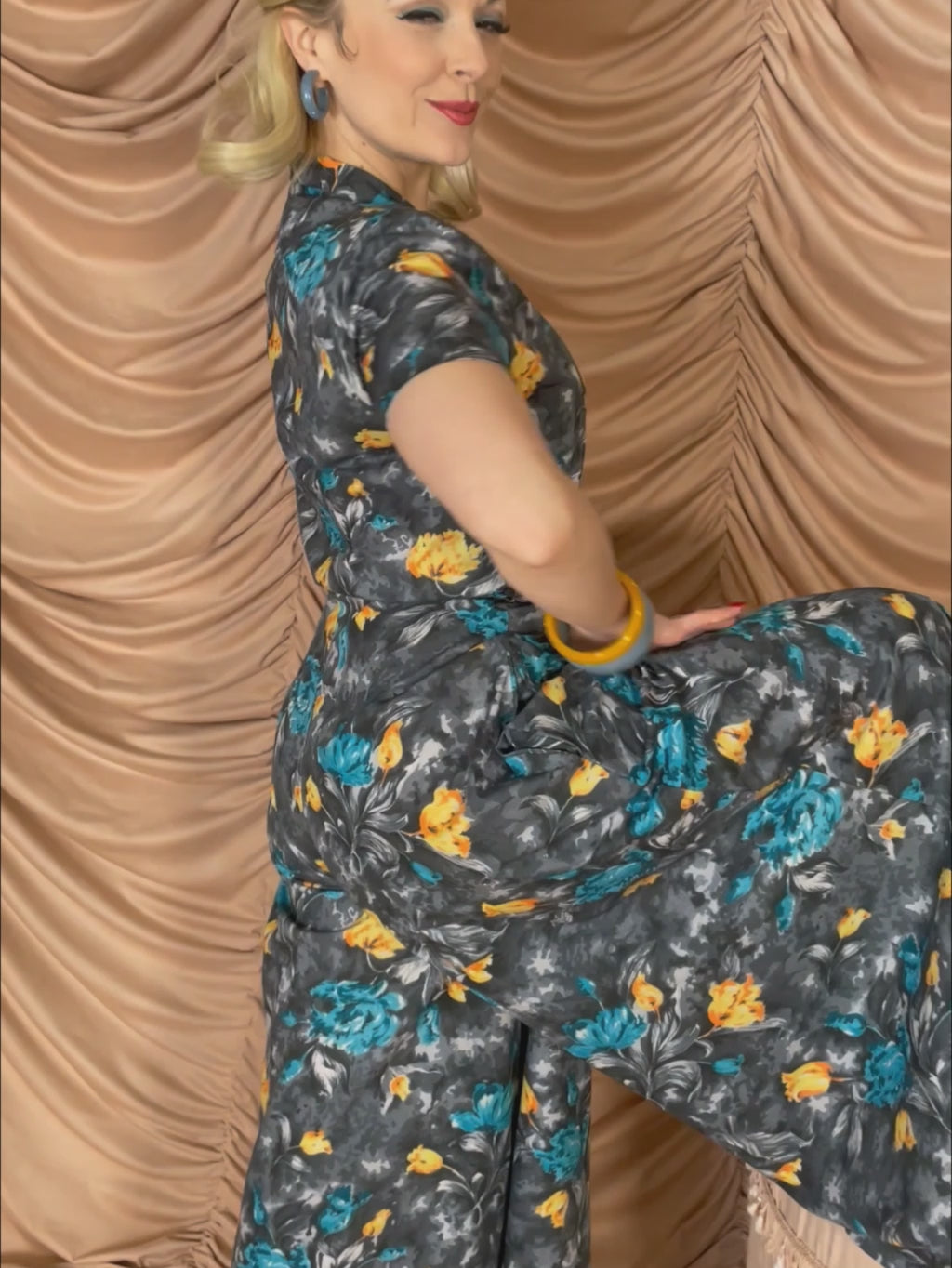 Film of Lucy beach pyjamas in motion showing wide leg flow