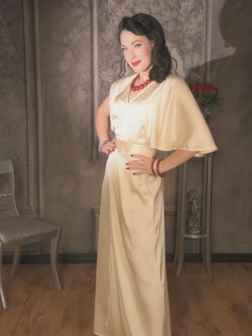 1930s style showgirl dancing in our peach satin robe.