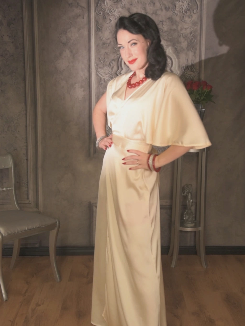 1930s style showgirl dancing in our peach satin robe.