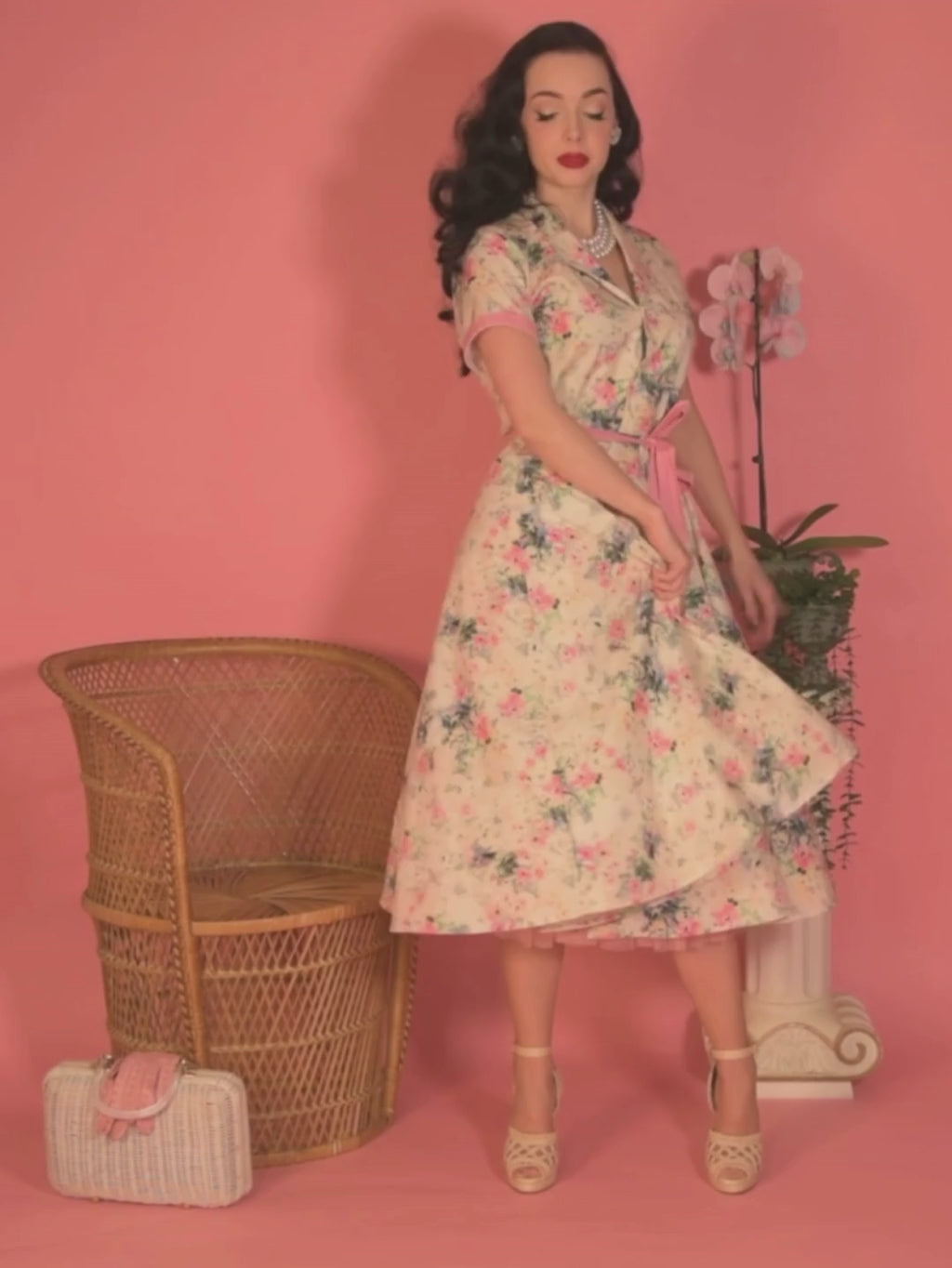 Light pink floral pink shirt dress worn with two petticoats.