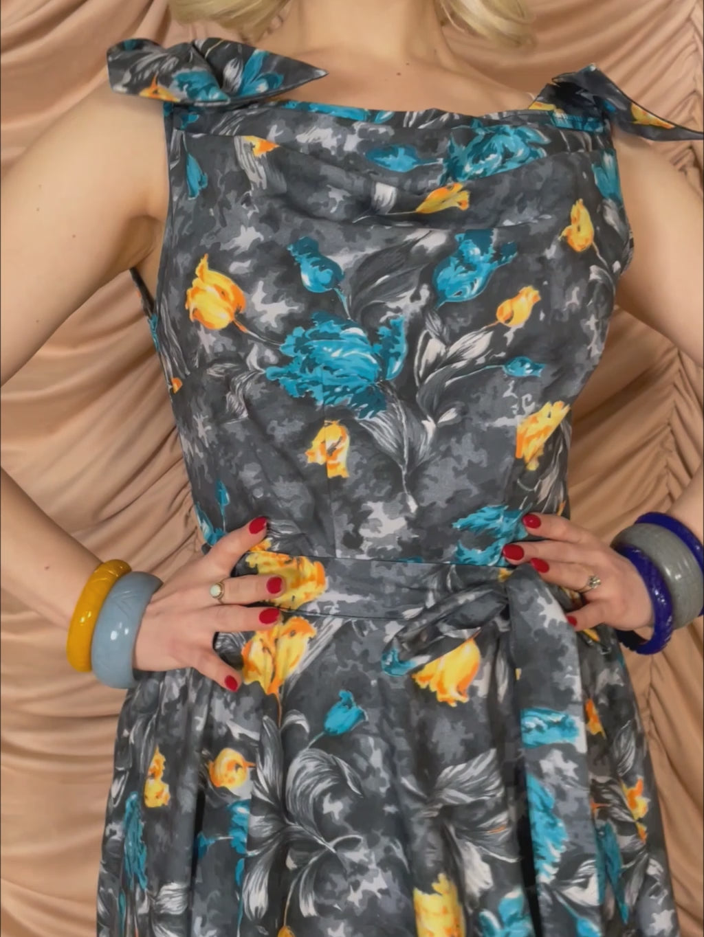 film of model wearing Edwina 1950s cowl neck dress with full circle skirt