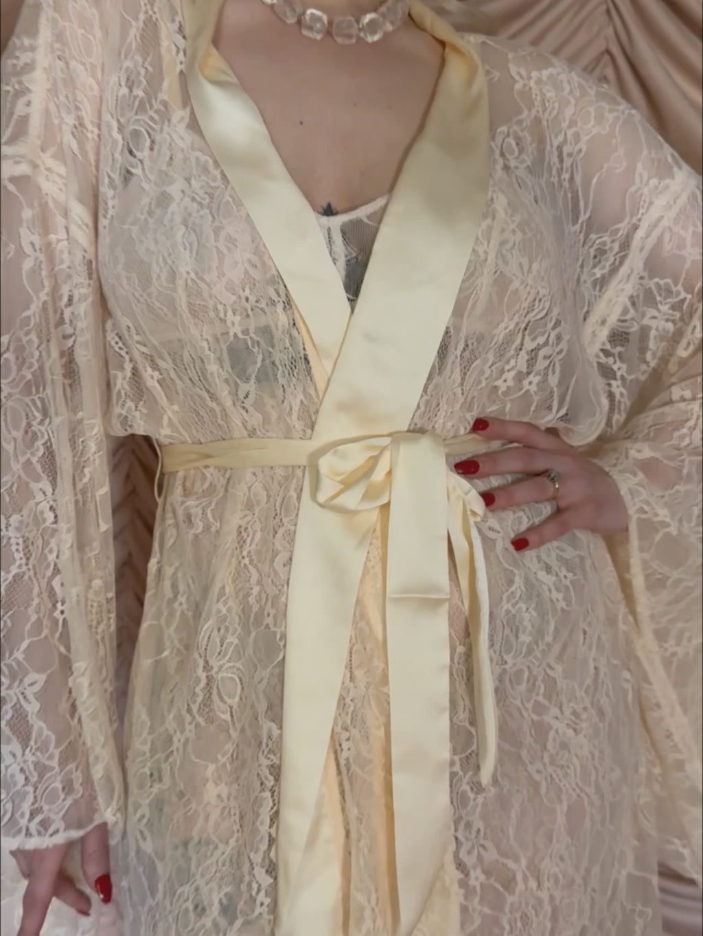 video of peach vintage lace short kimono robe worn over matching camiknicker