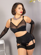 black pull on powermesh suspender belt worn with black soft cup bra and long black gloves