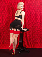 red contrast seamed stockings worn with back 1950s girdle