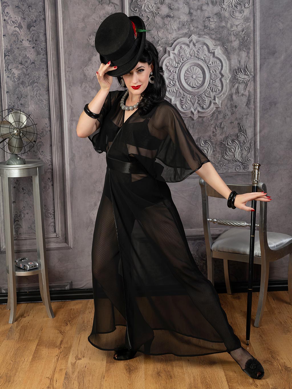 retro full length robe in sheer black georgette worn with fishnet tights