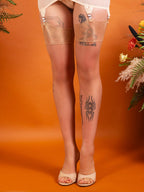 sheer gloss stockings in a light skin tone, worn with a vintage peach corselette and high heeled mules