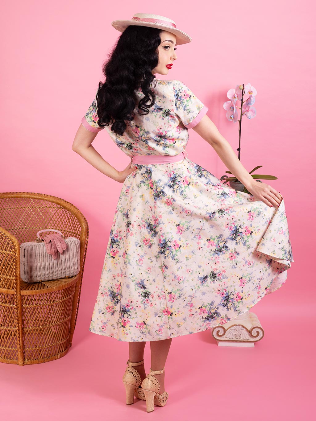 Light pink floral pink shirt dress worn with two petticoats.