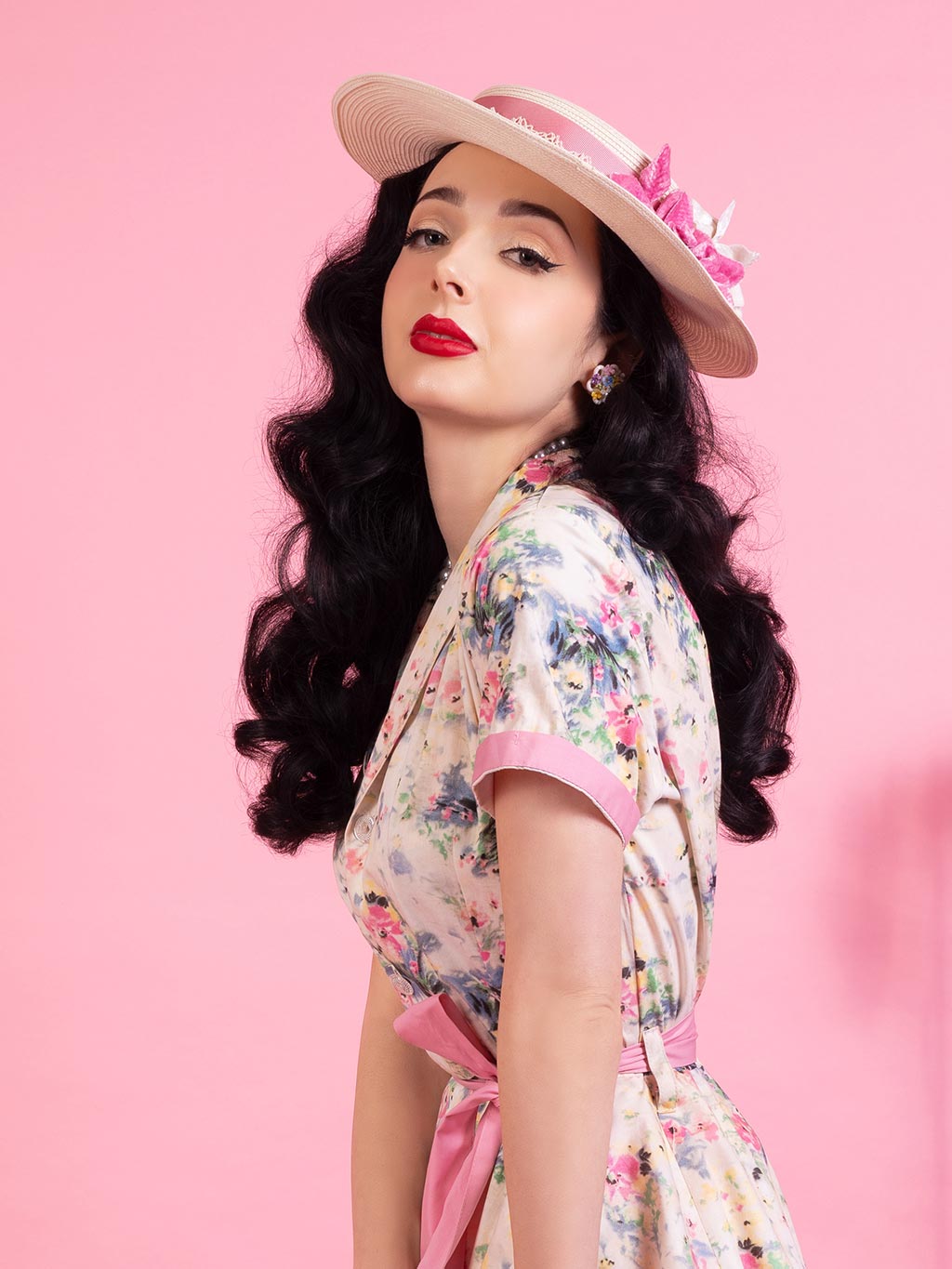 Light pink floral pink shirt dress worn with two petticoats.