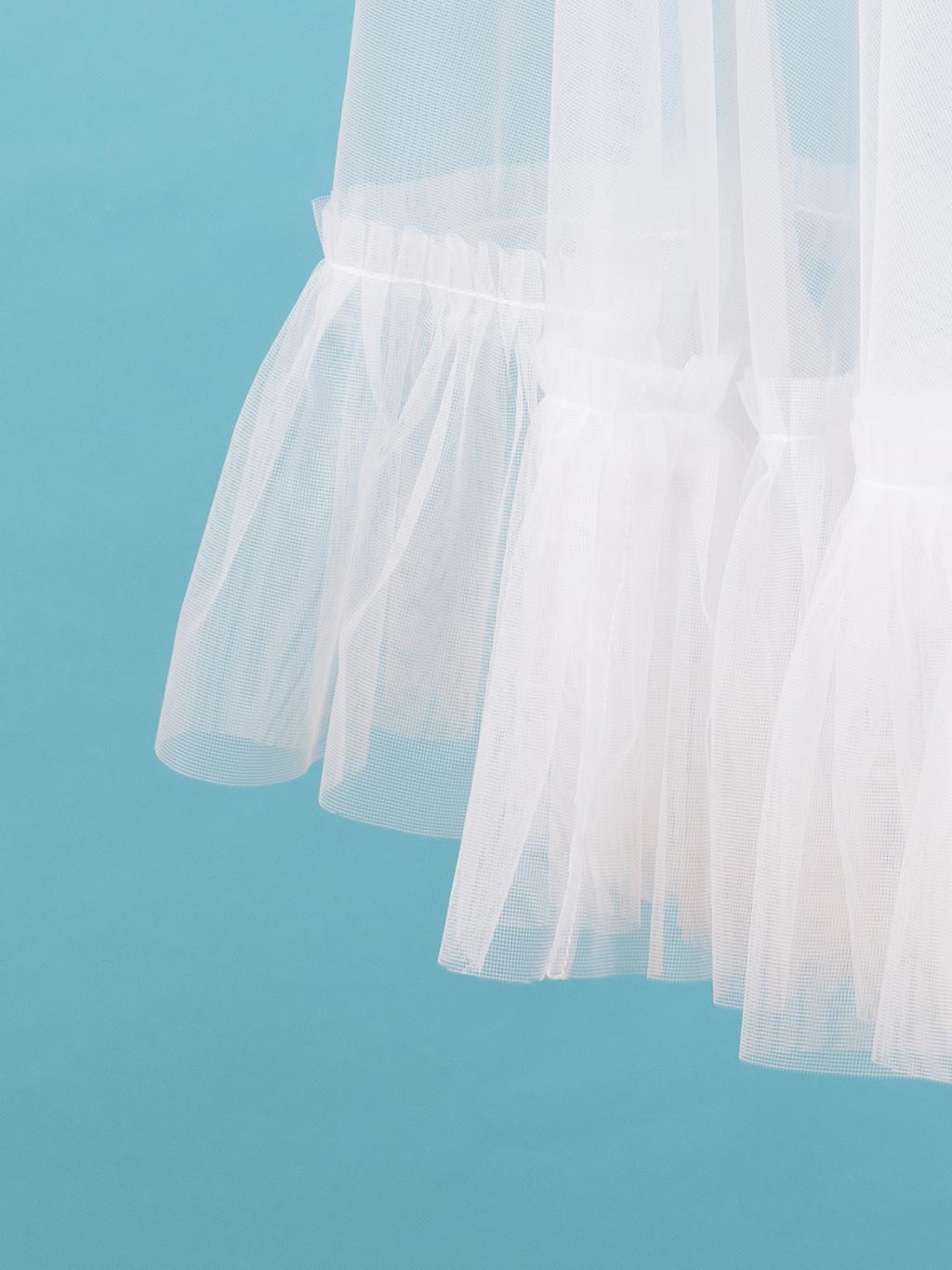 Close up of white petticoat