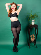 Black Opaque Tights by 1950s tights brand What Katie Did. Just part of our collection of retro inspired tights and stockings.