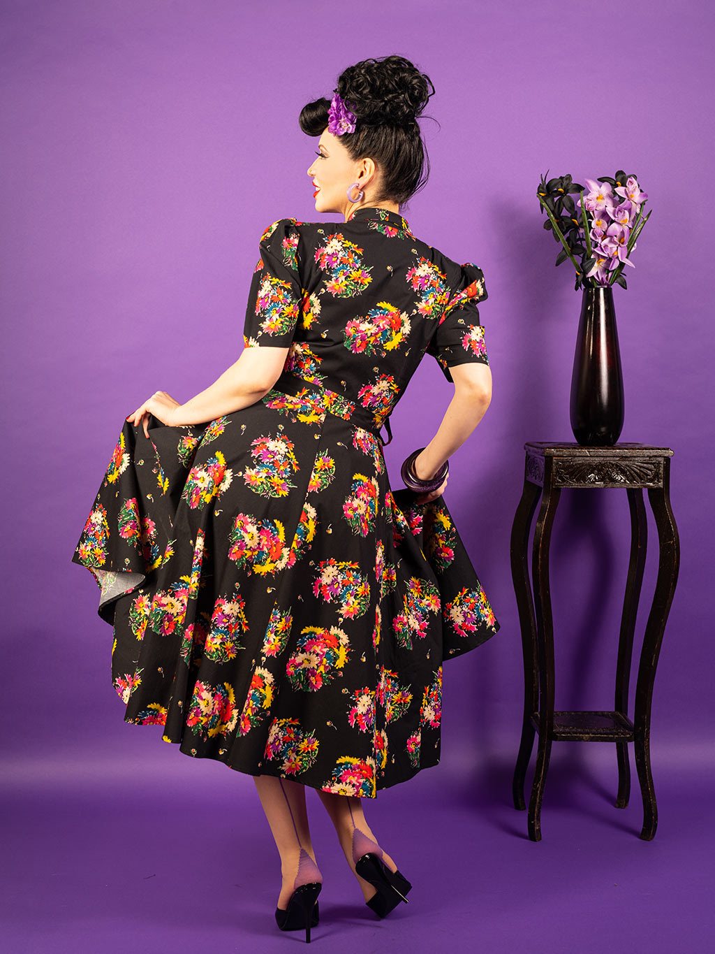 Retro black floral dress.  Vintage inspired black cotton shirtwaist dress with floral pattern.  Fitted shirt style top with buttons down front and full skirt falling just below the knee