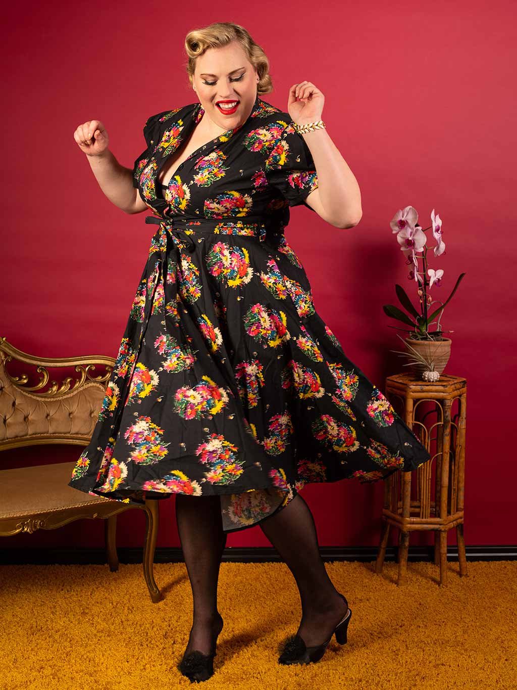 Retro black floral dress.  Vintage inspired black cotton shirtwaist dress with floral pattern.  Fitted shirt style top with buttons down front and full skirt falling just below the knee