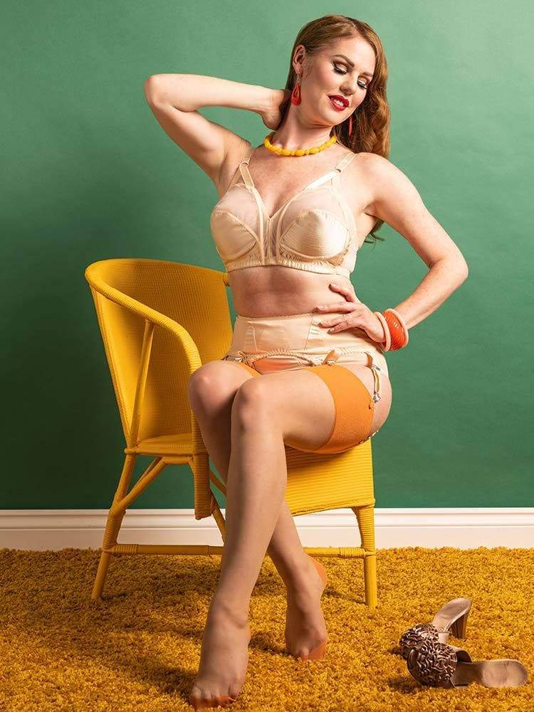 Glamour contrast pumpkin seamed stockings by What Katie Did. 1950s inspired seamed stockings with nude leg and contrasting orange seam. Shop seamed stockings as What Katie Did