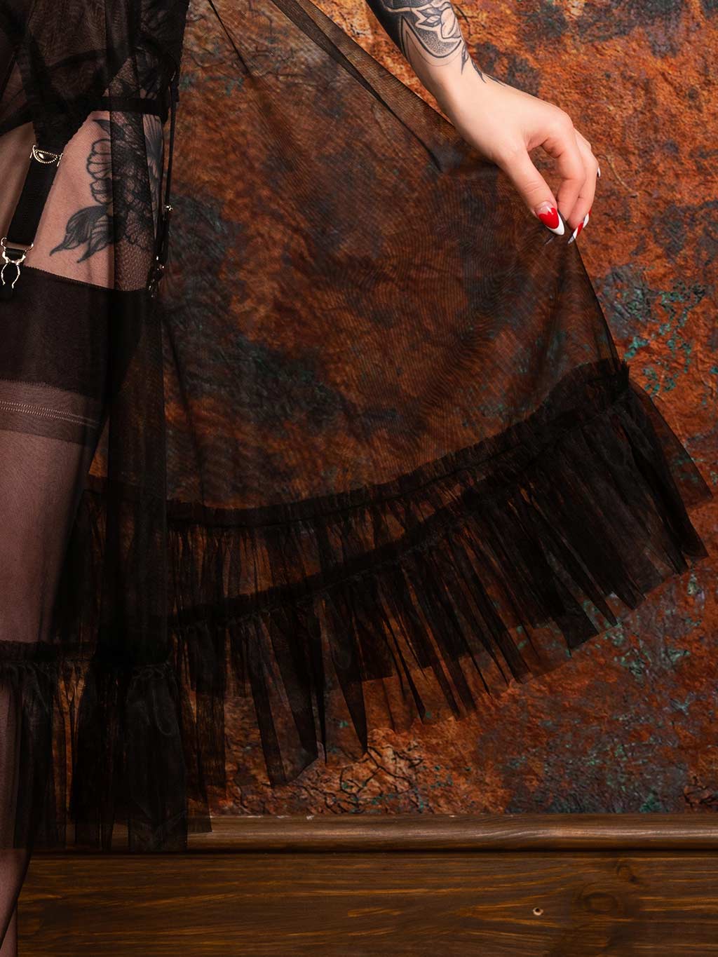 close up of a vintage black sheer nylon petticoat